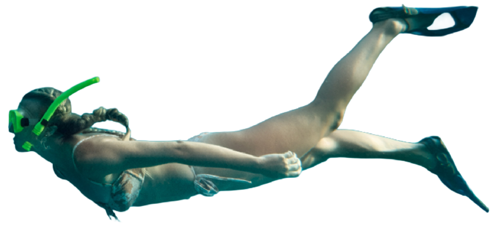 Woman swimming underwater in crystal clear Thassos sea water
